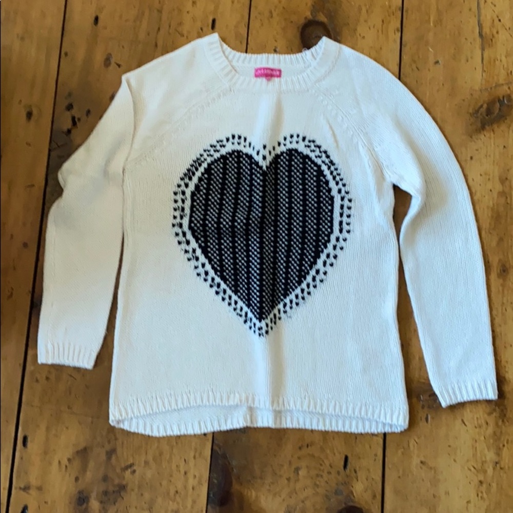 Sweater with a black heart